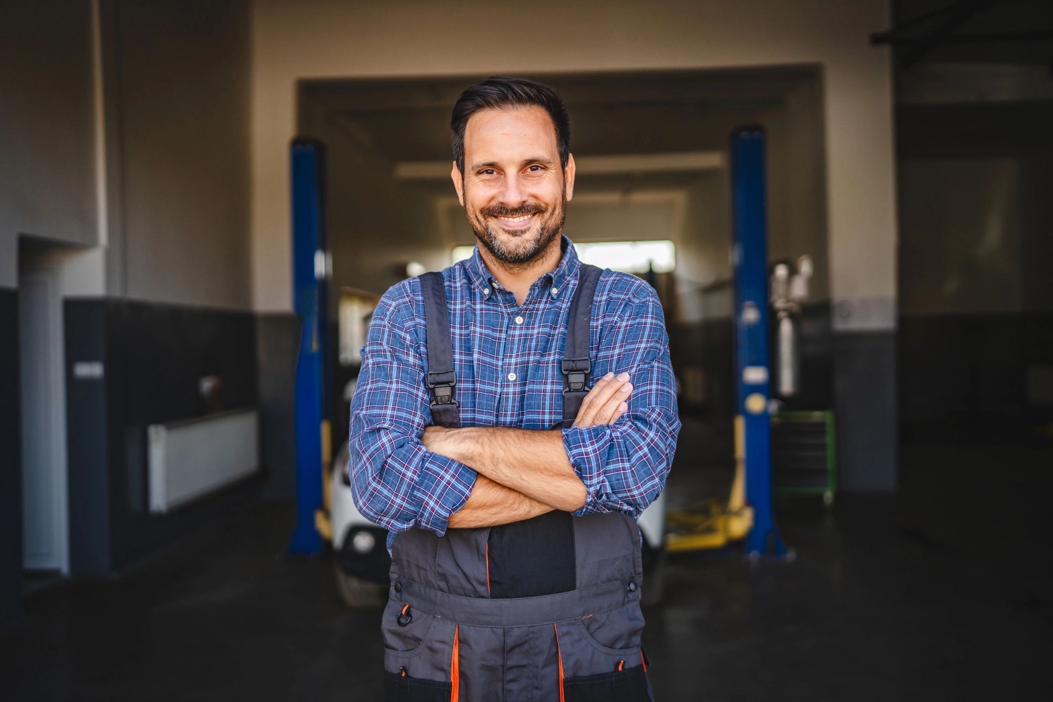 Service advisor greeting a customer at the shop